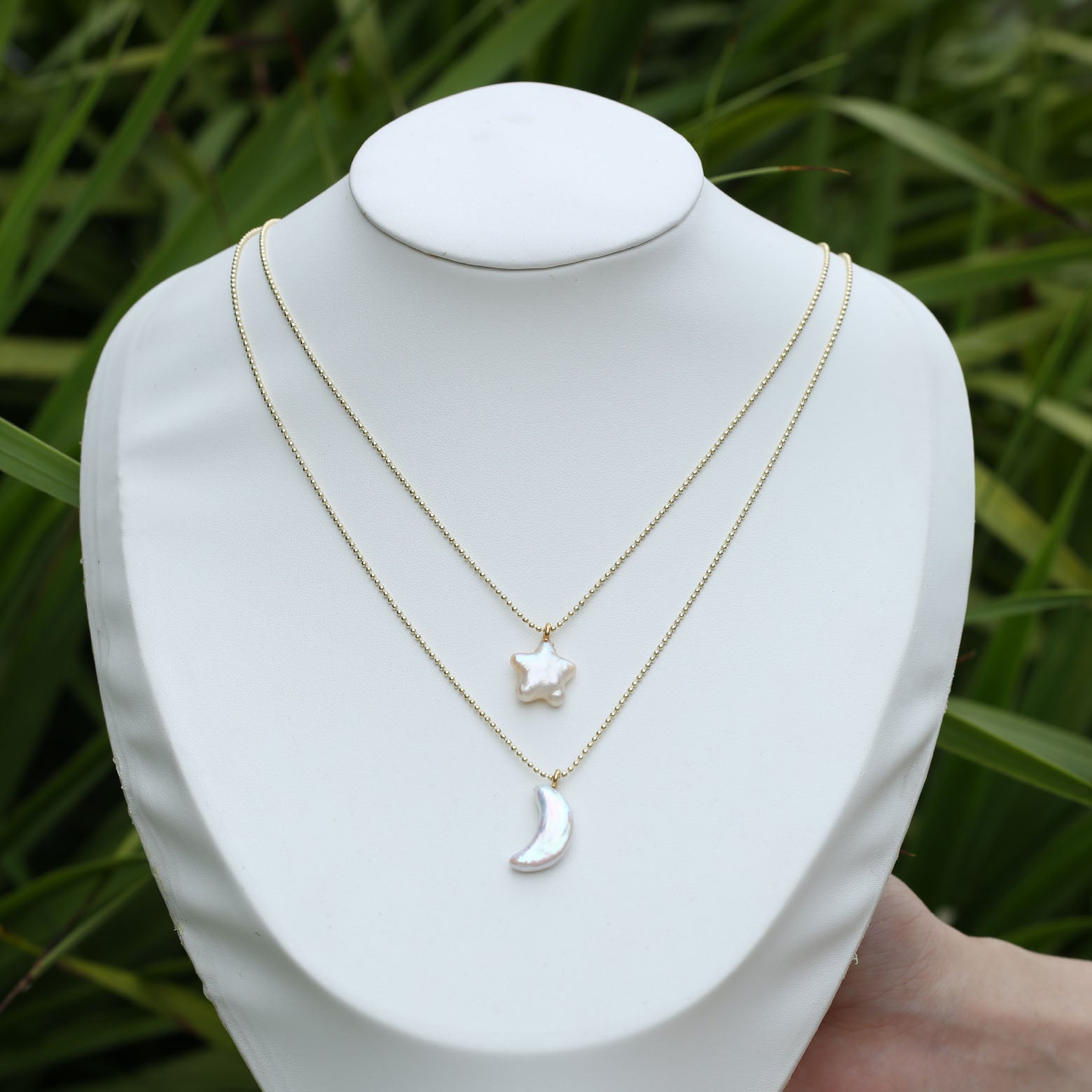 Star, moon and pearl pendant necklace