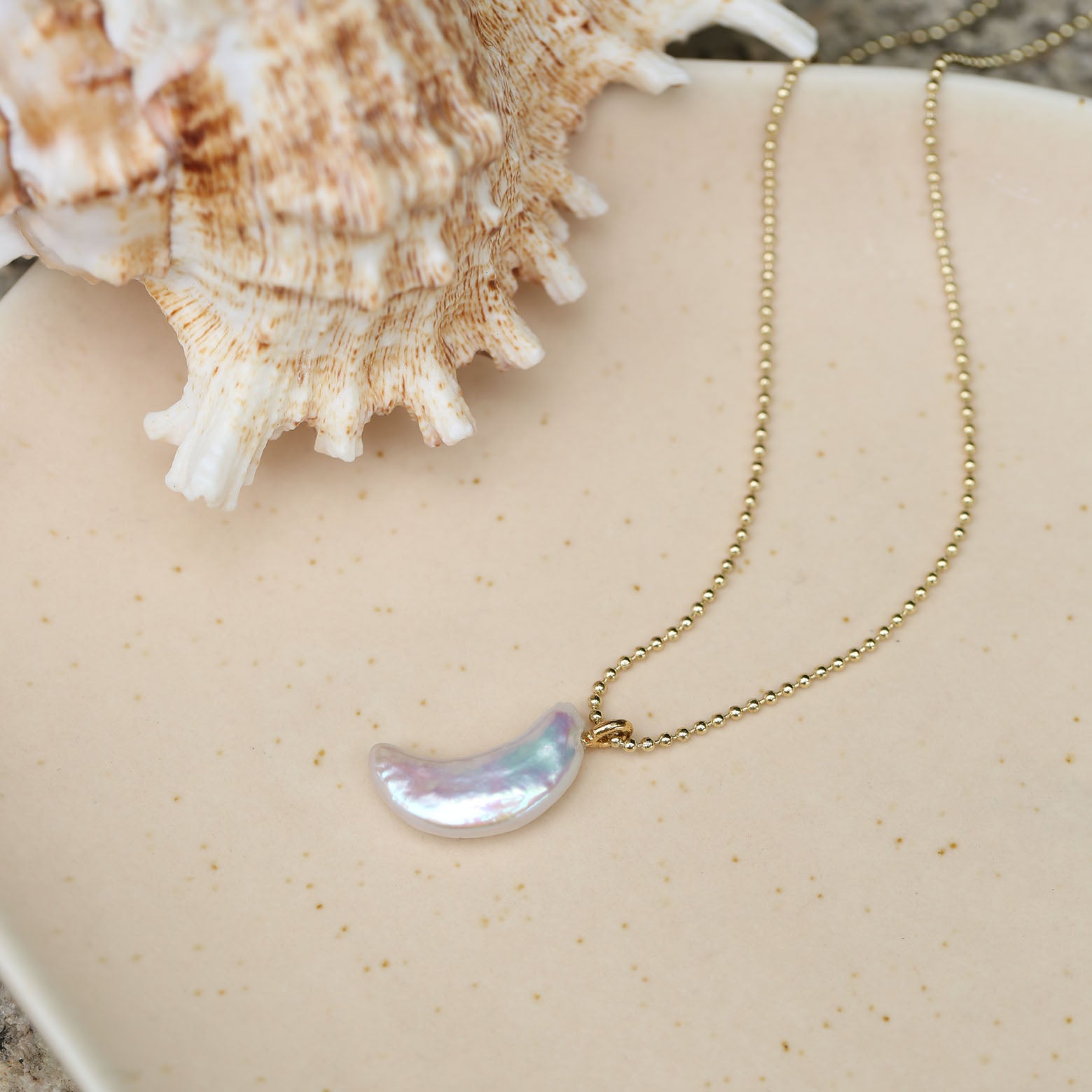 Star, moon and pearl pendant necklace