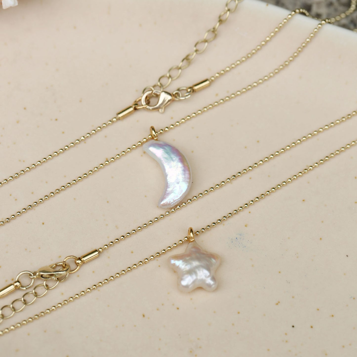Star, moon and pearl pendant necklace