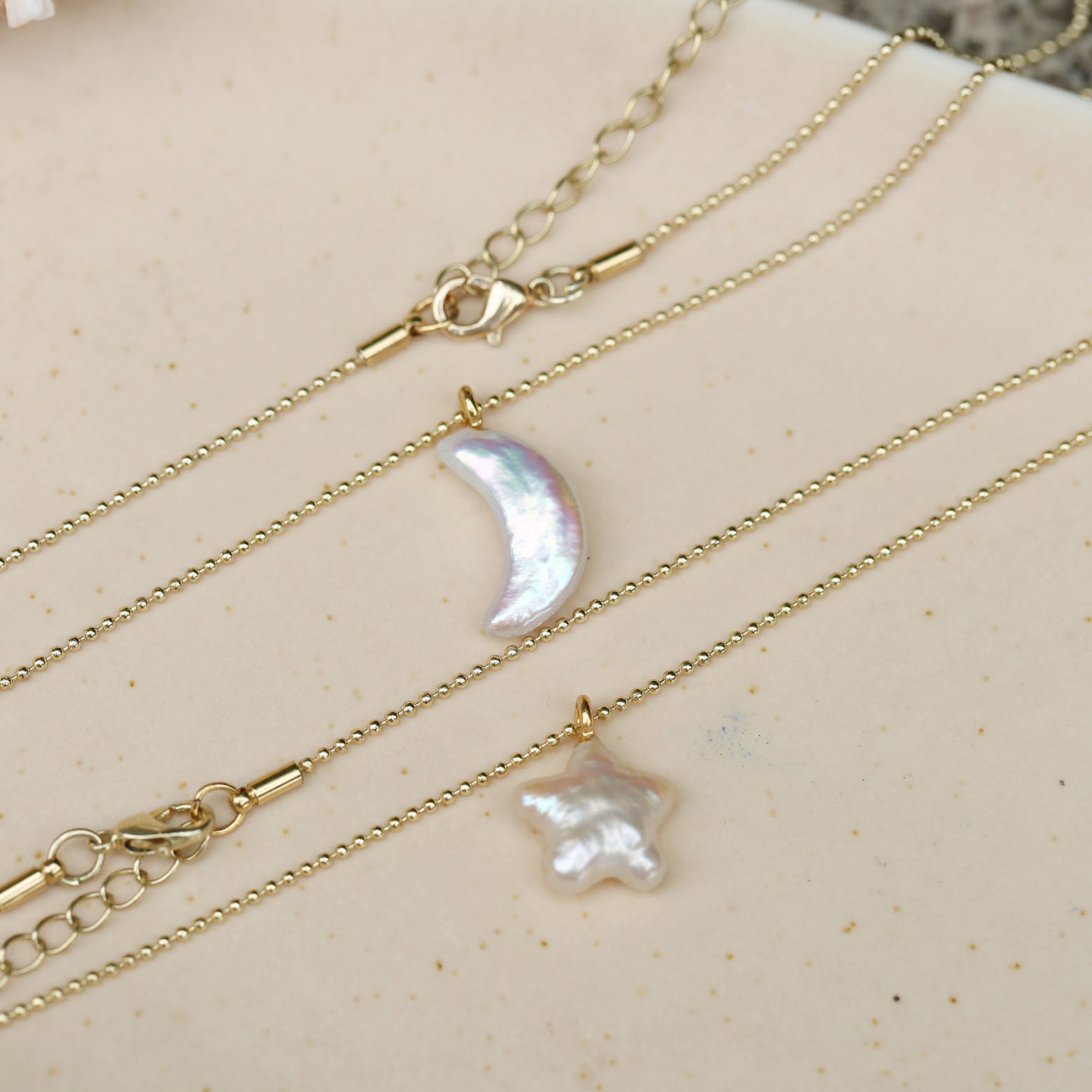 Star, moon and pearl pendant necklace