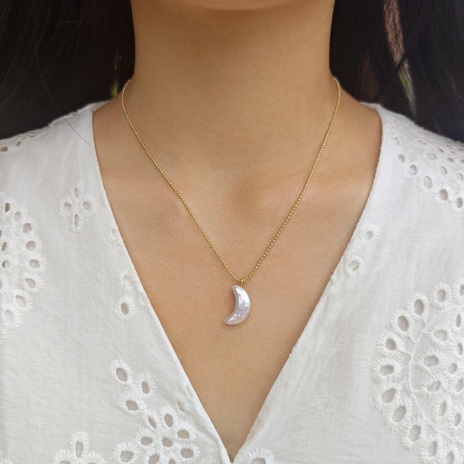 Star, moon and pearl pendant necklace