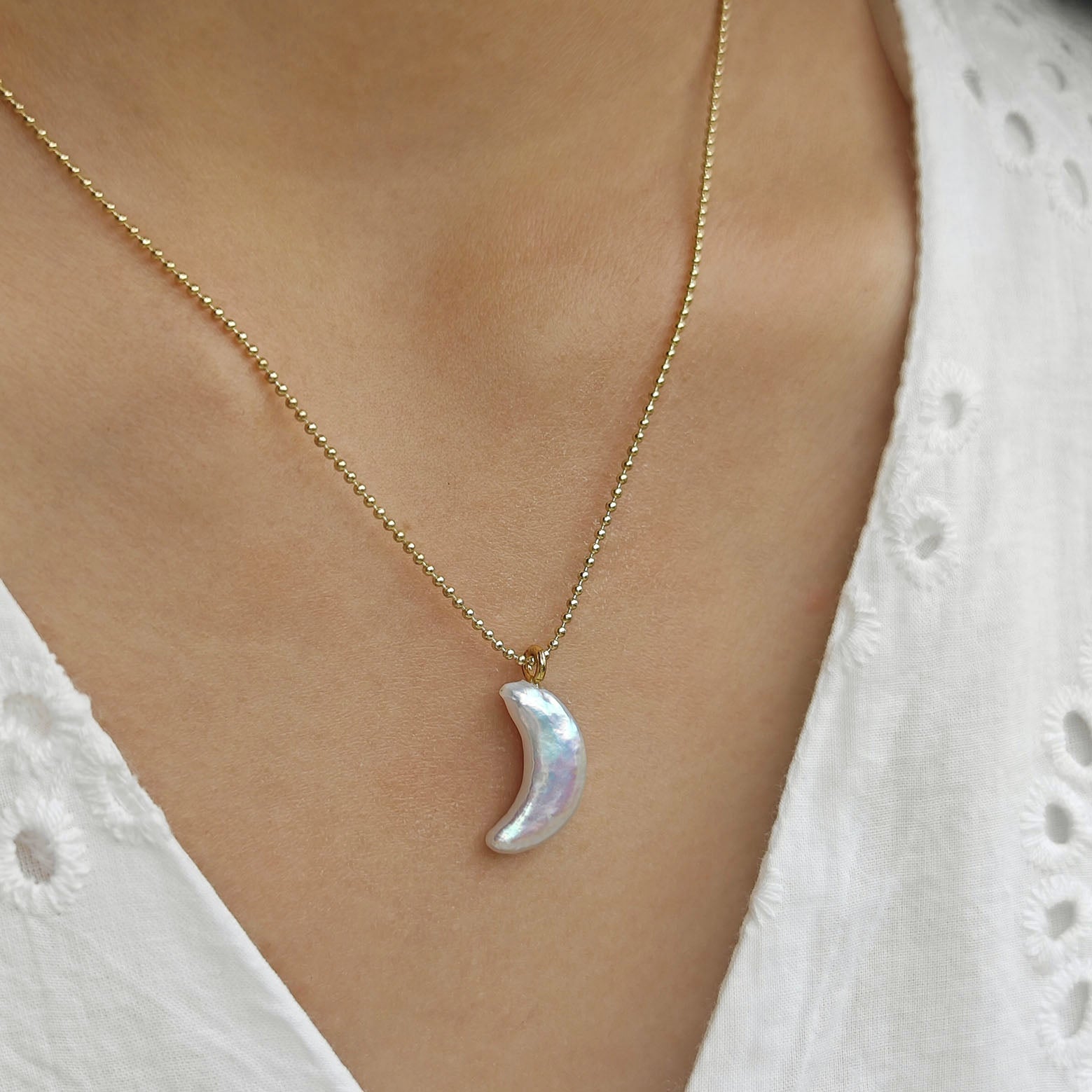 Star, moon and pearl pendant necklace