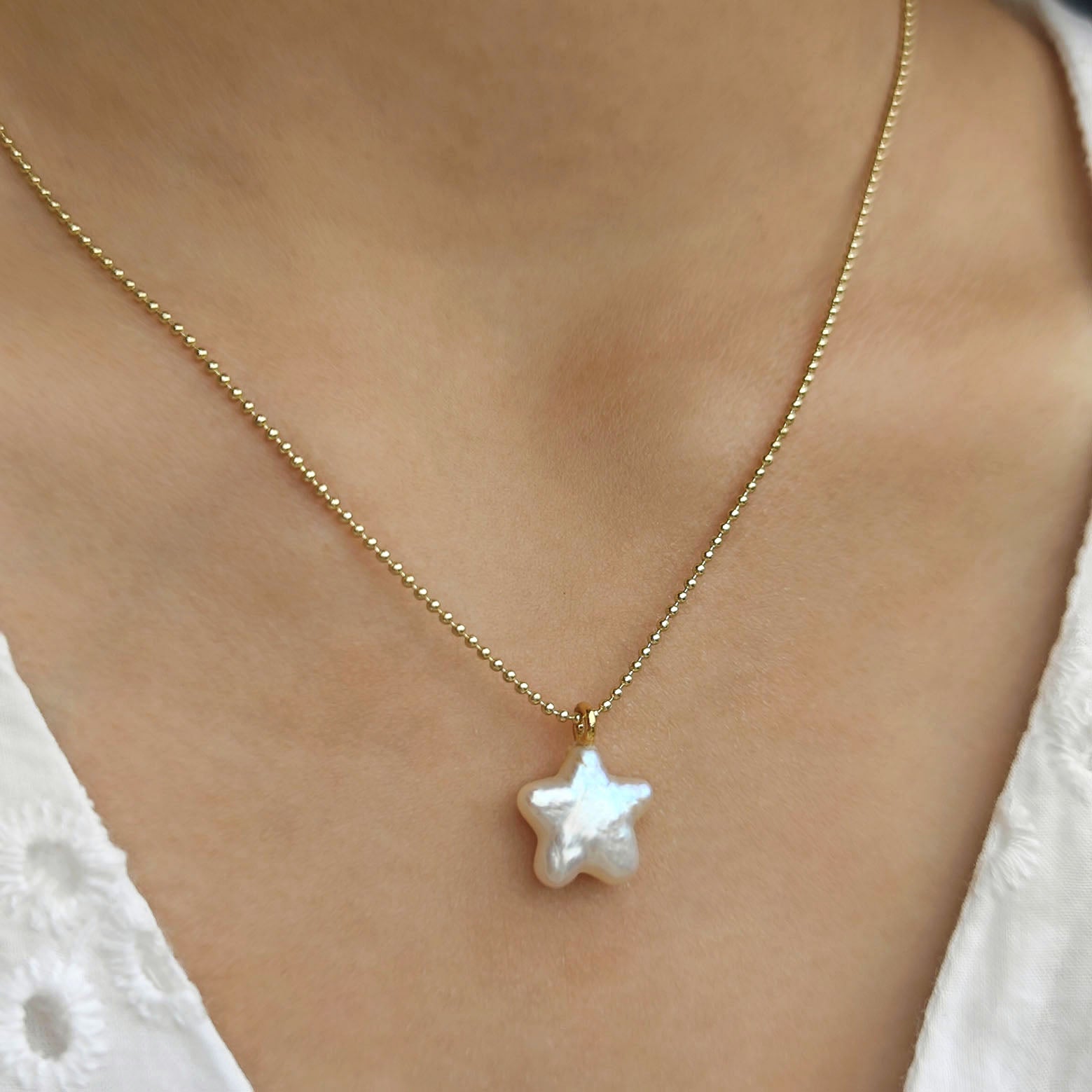 Star, moon and pearl pendant necklace