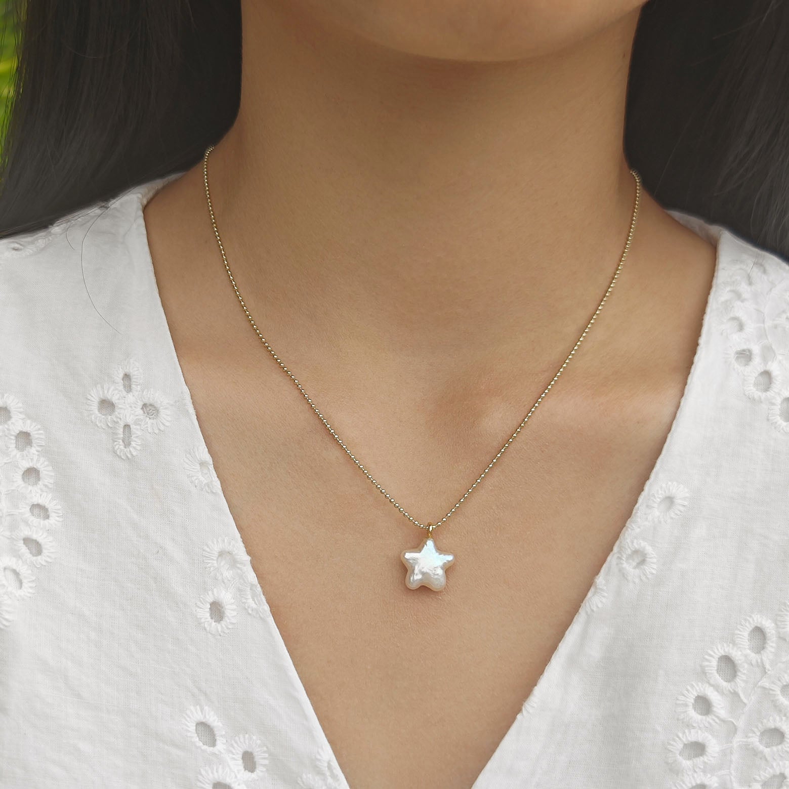 Star, moon and pearl pendant necklace